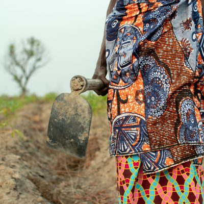 Local farmer dressed in colorful african cloths, Angola 2019